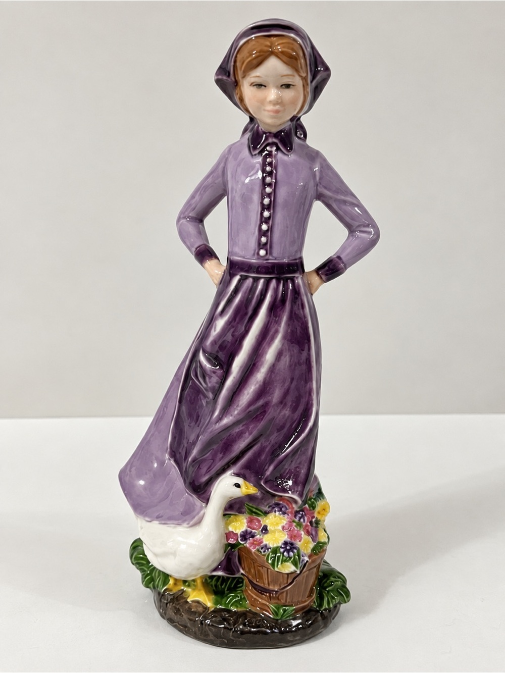 A Vintage 1970s–1990s Ceramic “Country Girl With Goose” Figurine